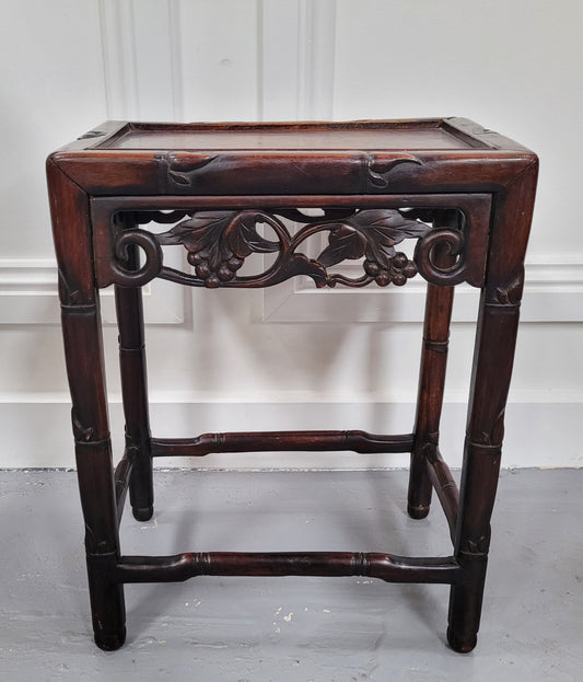Chinese Rose wood occasional table. Nicely carved and could be used as a coffee table or and occasional table. It is in good original condition.