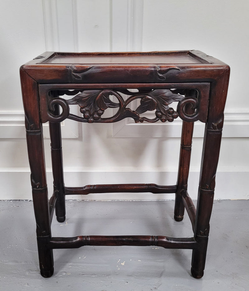Chinese Rose wood occasional table. Nicely carved and could be used as a coffee table or and occasional table. It is in good original condition.