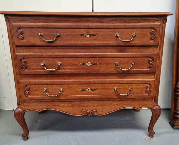 French Provincial Oak chest of three drawers. In good original detailed condition.