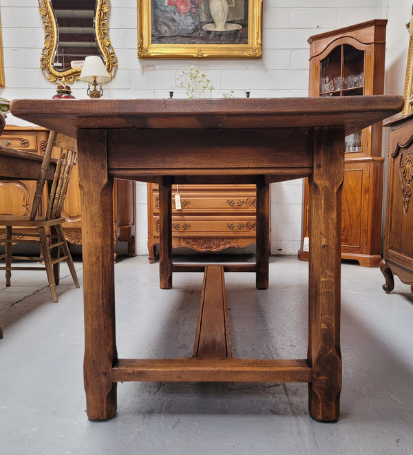 French oak stretcher base refectory table. It has been sourced from France and is in good original condition. Please see pictures to form part of the description.