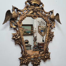 Interesting Italian gilt decorative framed mirror featuring birds. In good original condition.