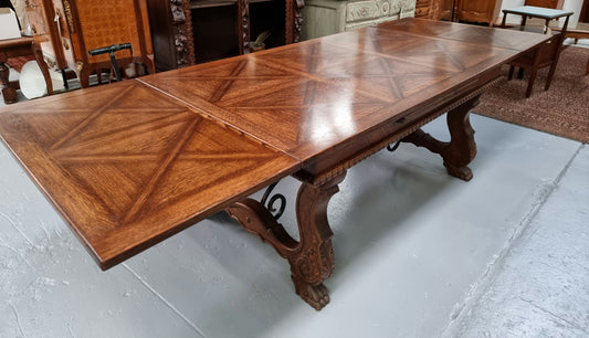 French Spanish style Oak parquetry top extension table. In good original detailed condition.