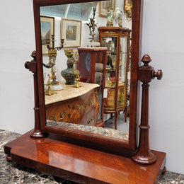 Antique Mahogany dressing table mirror. The mirror is still in good condition and tilts back and forward. It is in overall good original condition. Please view photos as they help form part of the description.