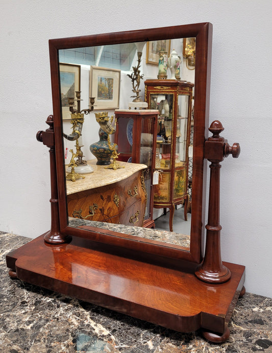 Antique Mahogany dressing table mirror. The mirror is still in good condition and tilts back and forward. It is in overall good original condition. Please view photos as they help form part of the description.