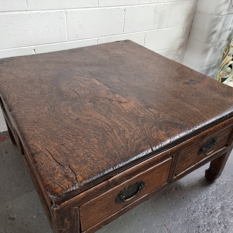Square Elm coffee table with oriental legs and two long drawers.  Beautifully finished and in good original condition. It has been sourced from France.