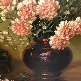 A signed oil on canvas painting of Carnations flowers in an ornate gilt original frame. Circa 1900's in good original condition.