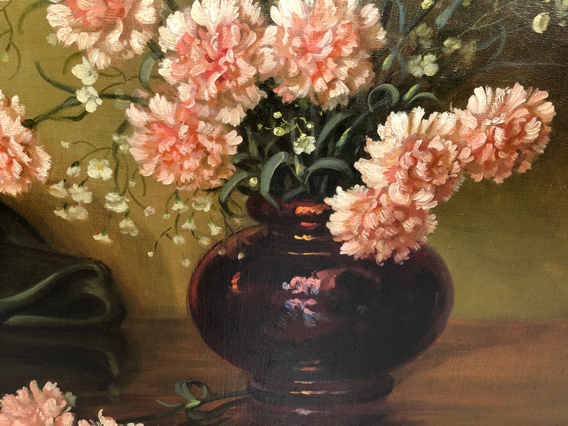 A signed oil on canvas painting of Carnations flowers in an ornate gilt original frame. Circa 1900's in good original condition.