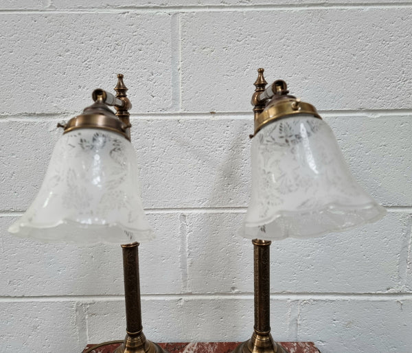 Pair of tall Antique style table lamps with glass floral etched shades. They have been sourced locally and are in good original detailed working condition.