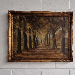 French signed oil on canvas depicting a charming landscape scene in a decorative gilt frame. It is in good original detailed condition and has been sourced from France.
