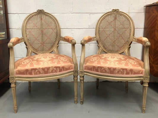 Pair Of French Louis XV Style Cane Back and Upholstered Seat Fauteuils