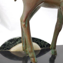 Absolutely gorgeous French cold painted metal Art Deco Statue of a lady and two deers on a marble base. Signed piece and in good original condition.