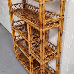 Vintage Tortoiseshell Bamboo Shelves.  Good size unit with irregular shelves. It is in good original condition and it very solid.