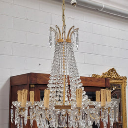 Fine French Empire basket shaped crystal chandelier. Consisting of ten exterior arms and four interior lights. It has stunning crystal's with prism drops. It has been sourced from France fully rewired to Australian standards.