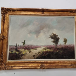 Beautifully framed oil on canvas landscape scene which is signed and in a decorative gilt frame. It is in good original condition.
