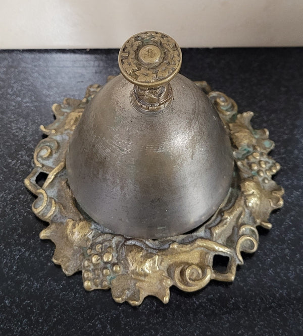 Vintage brass and white metal stone counter bell with a great ring, Circa 1920's. It is in great original condition. Please see photos as it forms part of the description.