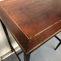 Elegant rectangular mahogany French brass inlaid occasional table. Is in good original condition.