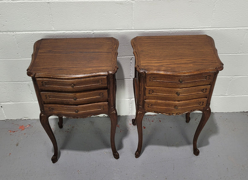 Lovely Louis XV style oak bedside cabinets with three drawers. In great original detailed condition.