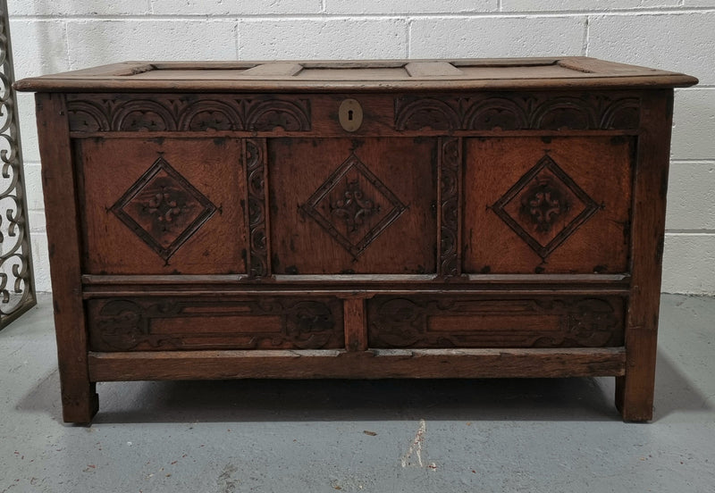 Early 19th Century French Oak carved coffer with a lift up lid for storage. A beautiful piece and in good original condition.