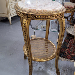Stunning Louis XV style two tier marble topped gilt lamp/side table. It has been sourced from France and is in good original detailed condition.