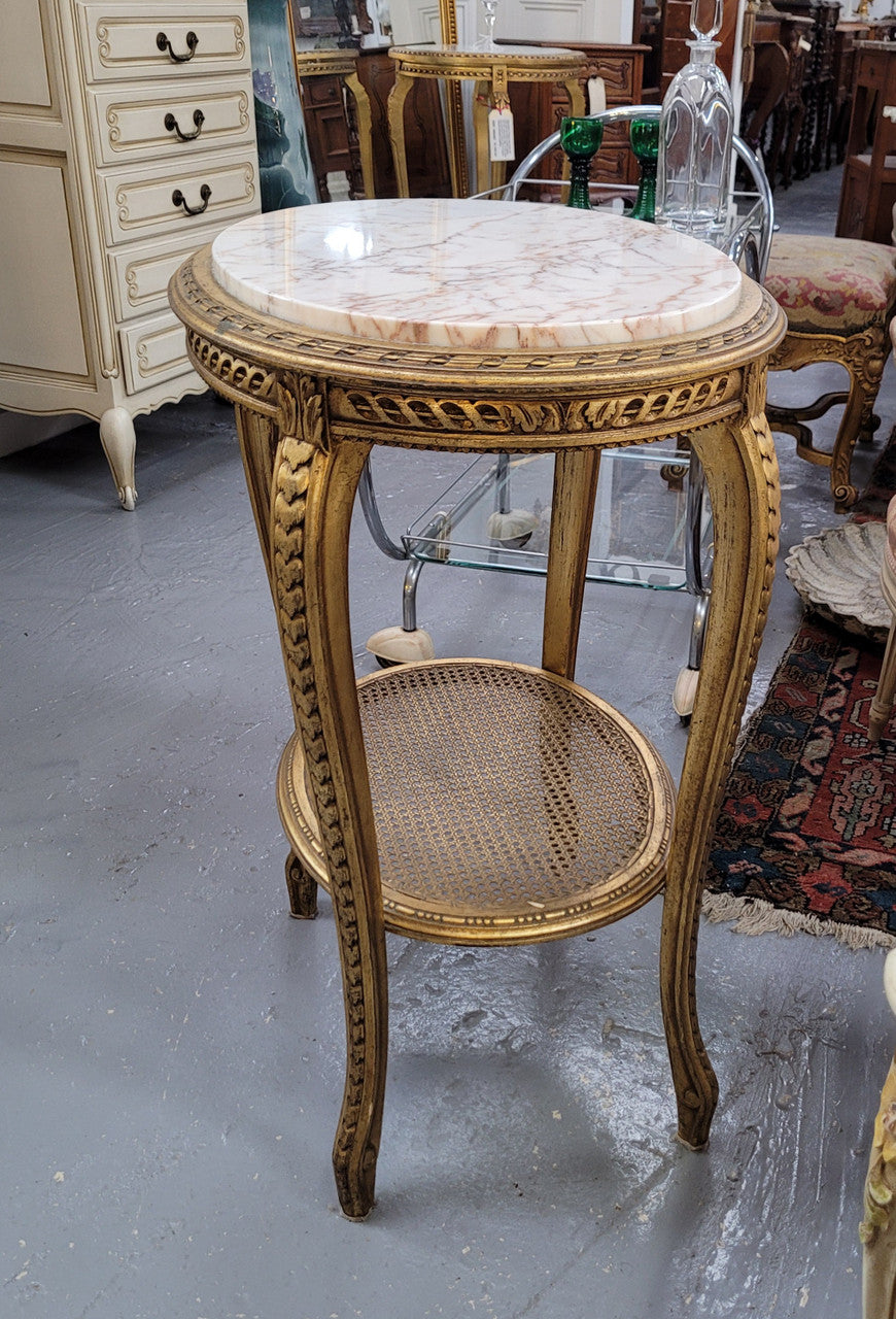 Stunning Louis XV style two tier marble topped gilt lamp/side table. It has been sourced from France and is in good original detailed condition.