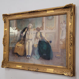 Delightful signed pastel behind glass of Pierrot and young women in an ornate gilt frame. In good original detailed condition.