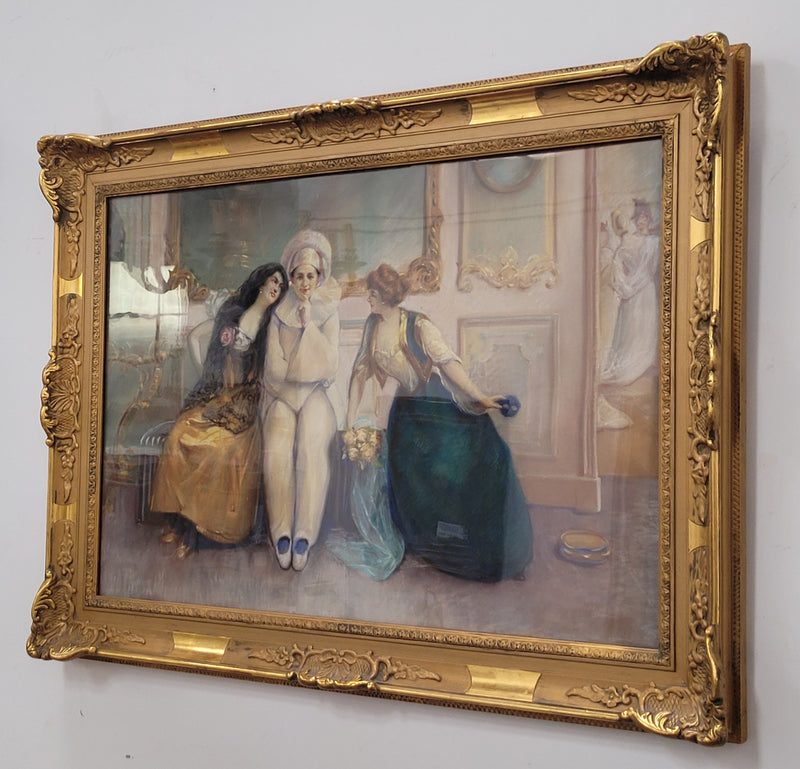 Delightful signed pastel behind glass of Pierrot and young women in an ornate gilt frame. In good original detailed condition.