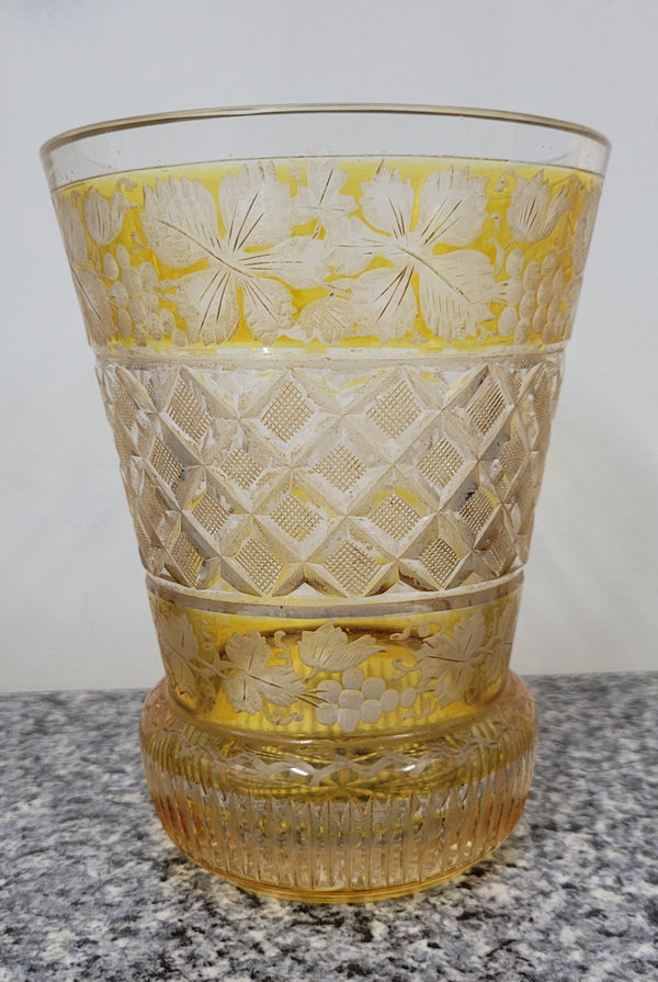 Antique Amber Bohemian acid etched and wheel engraved crystal vase. It has a stunning frieze of vine branches and a star cut base. It is in good original condition, please view photos as they help form part of the description.