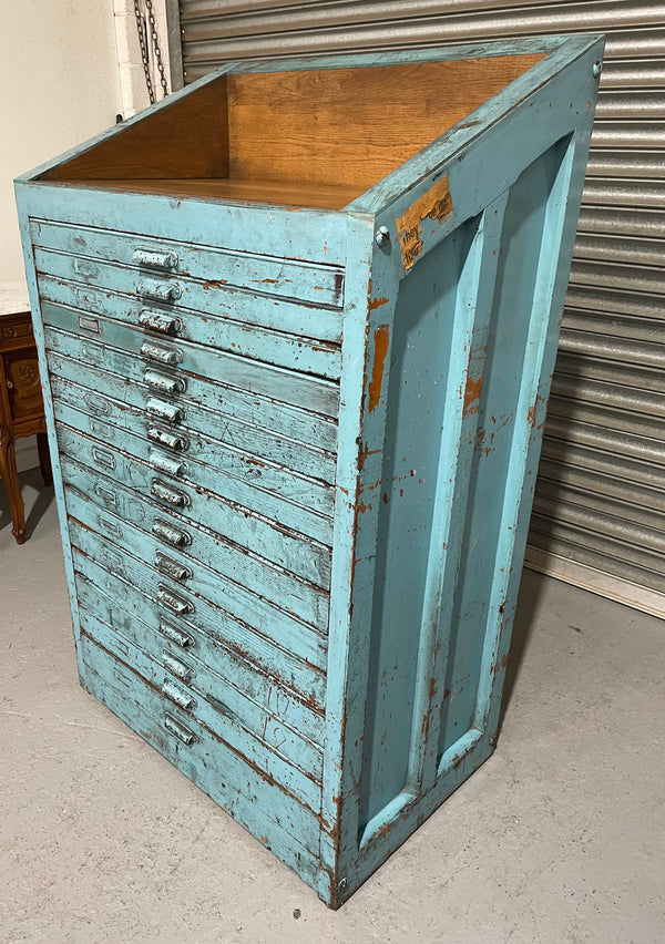 Fabulous set of vintage painted blue printers drawers that have adjustable separators which can be taken out for large papers. The drawers are various sizes and there is a section on top for working on or for storing brushes or tall items . These would be perfect for artists or jewellery pieces or even architects. Such a beautiful piece of industrial furniture.