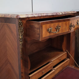 Walnut Louis XV style marble top abbattant with beautiful parquetry inlay and ormolu mounts. It has plenty of storage space with four large drawers and four smaller internal drawers. Beautiful drop down desk with a leather insert. In very good original detailed condition.