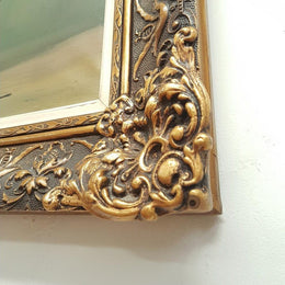 An Antique framed floral painting of lilacs in a vase on canvas, signed and in fantastic original condition.