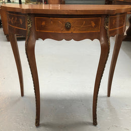 Stunning small inlaid French Walnut Louis XV style hall table with ormolu mounts and beautiful details. It has been sourced from France and is in good orignal detailed condition.