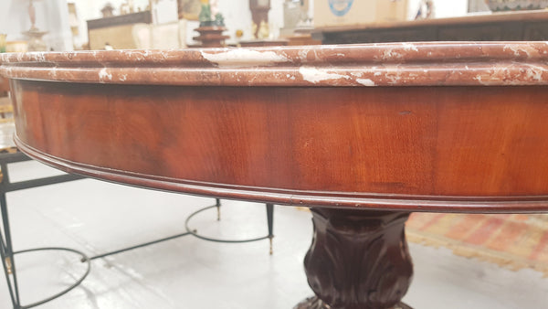 A superb early 19th century French Louis Philippe mahogany centre table, with original round carved rough marble with reeded-edge and is in good original condition.