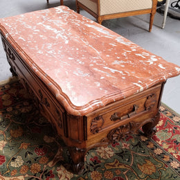 Amazing original walnut Louis XV style coffee table with a marble top, one drawer on either end and a faux drawer at the front. In good original detailed condition, sourced in France.