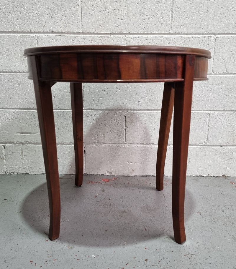 Round Art Deco Coffee Table with veneered top.  In good original condition.