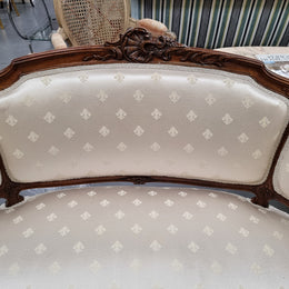 Pretty French Louis XV style small Walnut settee with very good upholstery. Sourced from France and in good original condition, please view photos of the upholstery as it helps form part of the description.
