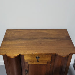 Queensland side cabinet of generous proportions. It has 1 drawer and one door with plenty storage space. In good original detailed condition.