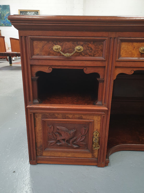 Victorian Burr Walnut ideal TV cabinet. Has plenty of room for a large TV and has plenty of storage space with 3 drawers and 2 cupboards. In good original condition.