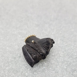 Lovely carved ebony and seed pearl African head brooch. It is in great original condition.
