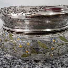 Silver lidded dressing table powder/trinket bowl with beautifully hand-painted floral enamel. In good condition please view photos as they help form part of the description.