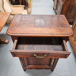 Louis 15th style oak 19th century cabinet with lovely brass hinges, handles & charming carving.  Circ: 1860's. In good original condition.