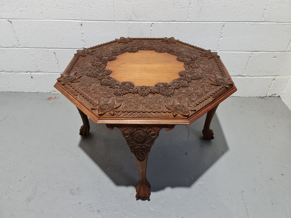 Heavily carved Teakwood round Chinese coffee table. In good original detailed condition. Circa: 1920