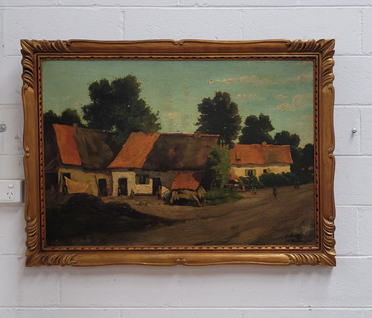 Fabulous signed French oil on canvas painting of a farmhouse scene in a beautiful Art Deco frame. It is in good original detailed condition.