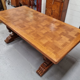 Amazing French Oak Renaissance style parquetry top extension table. Beautiful parquetry top and amazing detailed carvings on the legs. It extends to 306 cm long when fully extended. Sourced from France and in good original detailed condition.