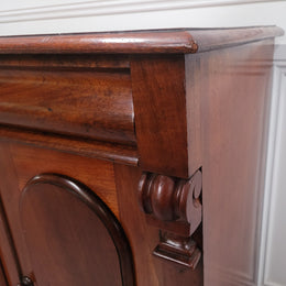Cedar side cabinet with two doors one drawer and lovely door panels and corbels. It has been sourced locally and is in good original detailed condition.