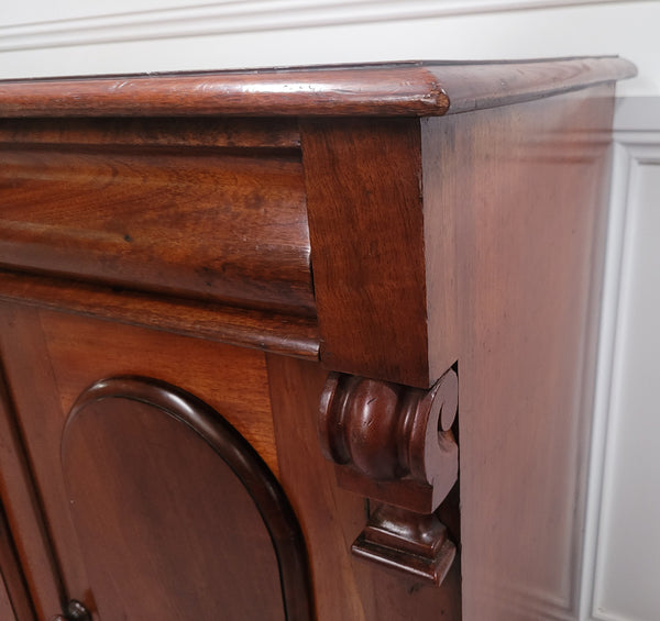 Cedar side cabinet with two doors one drawer and lovely door panels and corbels. It has been sourced locally and is in good original detailed condition.