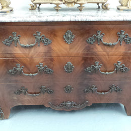 A Grand French Louis XV Style Flame Mahogany Commode