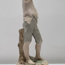 Lovely Italian figurine of boy carrying basket with grapes on a wooden base. It is signed Giuseppe Armani and 1982 FLORENCE. In good original condition.  Please view photos as they form part of the description.