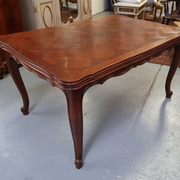 Beautiful French Oak Louis XV style parquetry top extension table. When fully extended the tables length is 239 cm. It is in good original detailed condition.