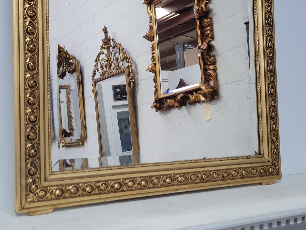 Impressive French Napoleon III water gilded mantle mirror. It is beautifully decorated with allegorical themes and has been sourced from France. In good original detailed condition with original mirror.