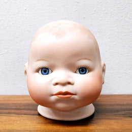 Large Bisque Dolls Head with beautiful blue eyes.  Marked on the back of the neck "Copy By Grace S utnam Made in Germany"  no chips or cracks please see photos as they form part of the description.